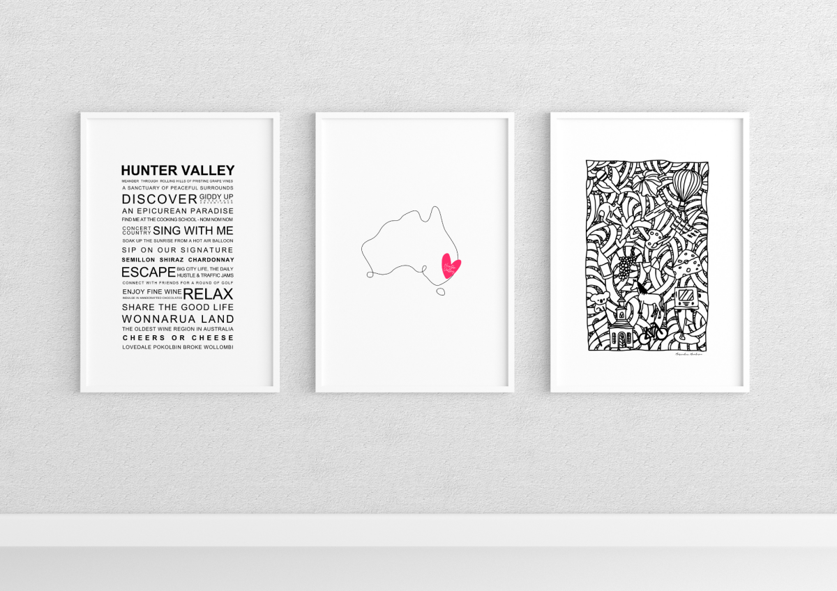 A set of three framed black and white posters displayed on a white wall. The left poster features text with bold and elegant typography highlighting phrases related to the Hunter Valley experience