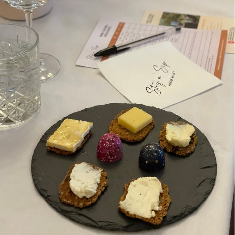 Tasting plate of local cheeses and chocolates.